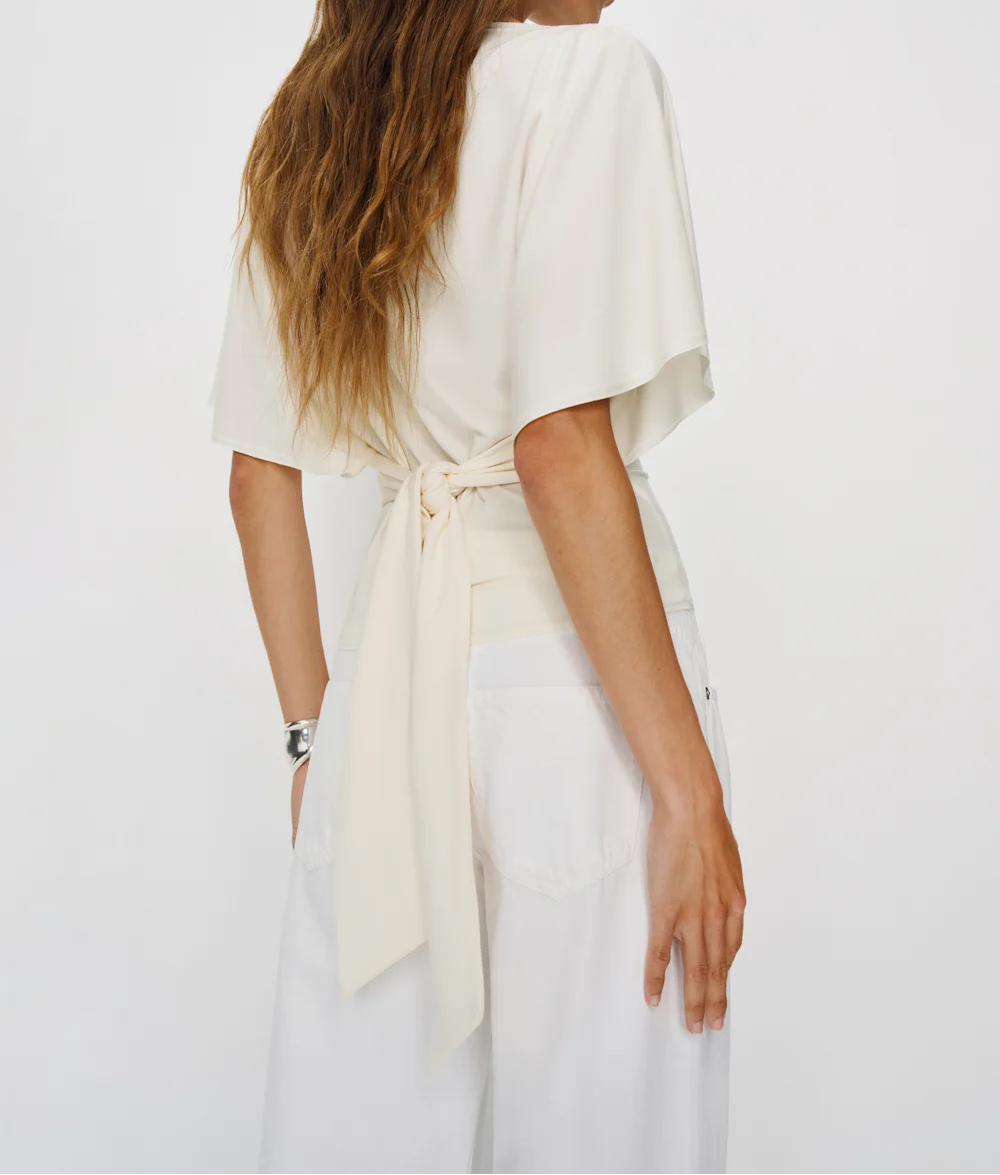 Stretch-knit top with tie back waist