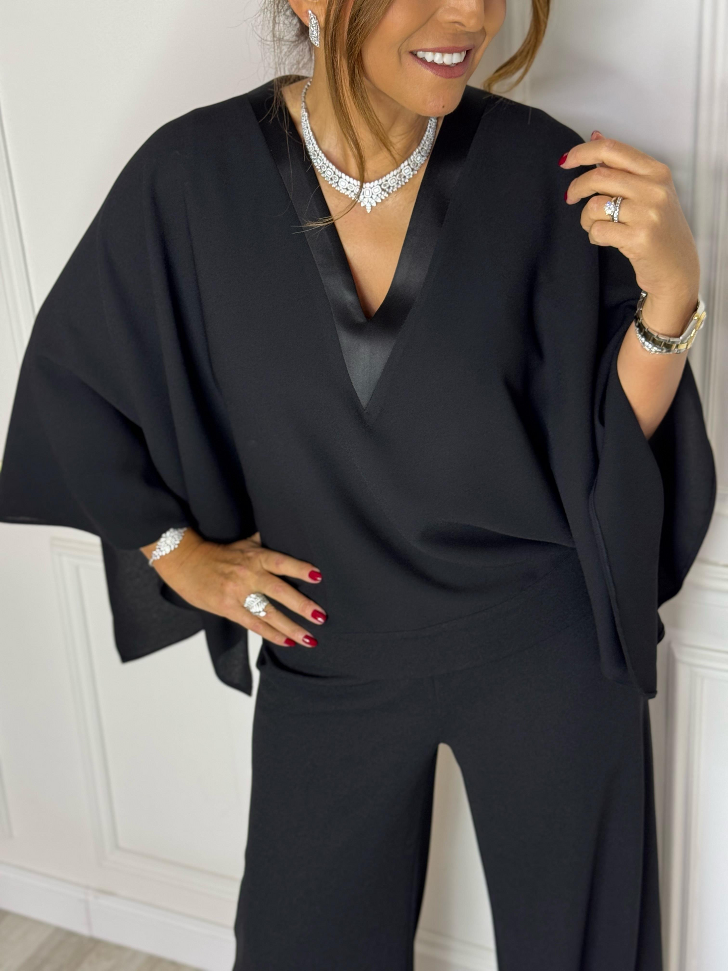 V-neck Lycra and black crepe evening jumpsuit