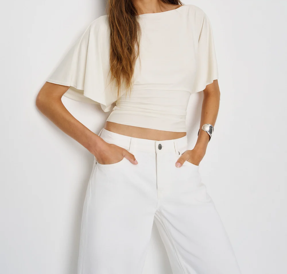 Stretch-knit top with tie back waist