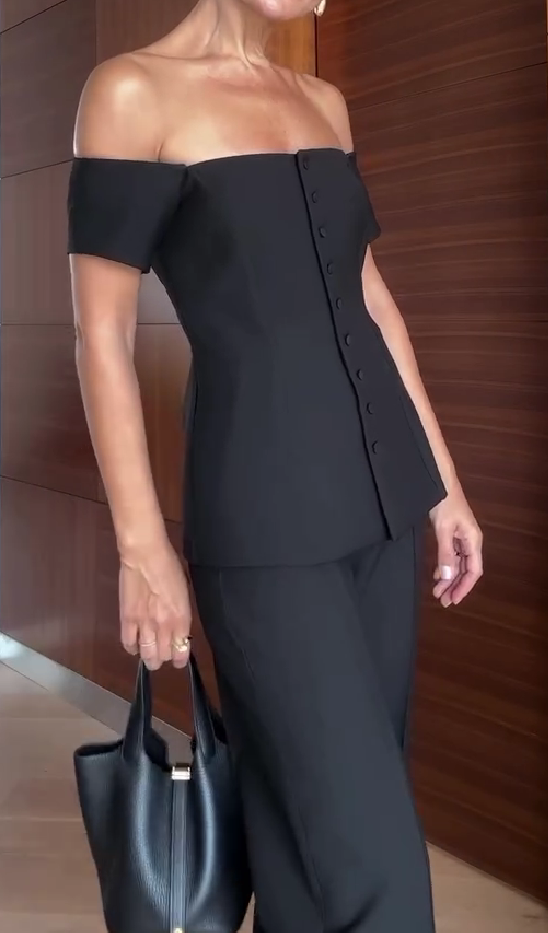 One-shoulder suit with multiple buttons and trousers