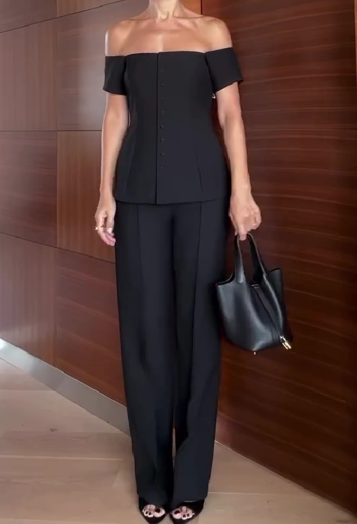 One-shoulder suit with multiple buttons and trousers