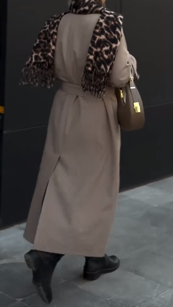Mocha-colored long trench coat with side buttons